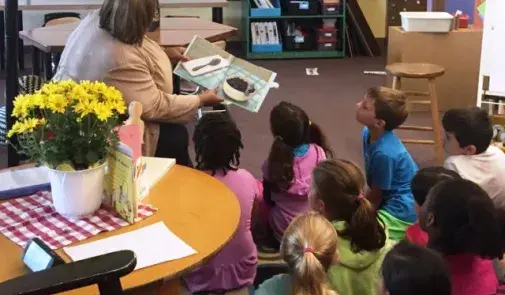 Lorretta Johnson reading to kids