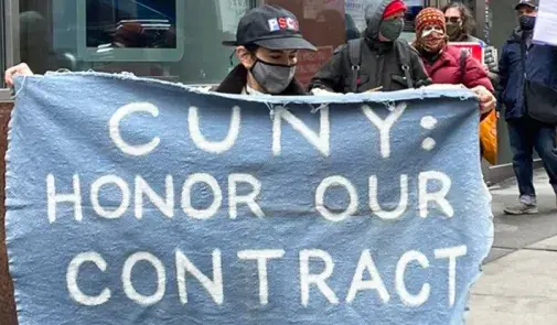 CUNY holds sign that says honor our contract