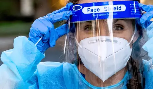 Nurse with face shield