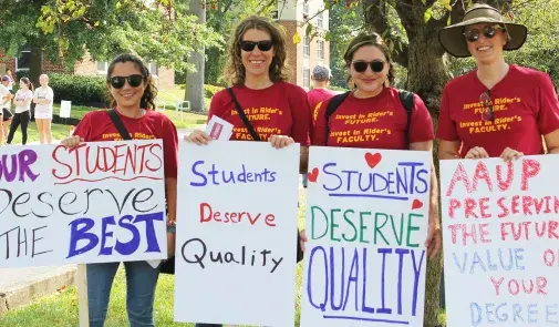 Women picketing at Rider University