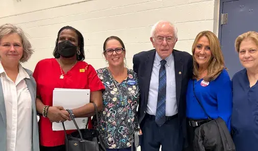 Photo of Sen. Bernie Sanders(I-Vt.) with HPAE president Debbie White (right), and others panelists who testified during a Senate HELP Committee field hearing on the national nursing crisis.