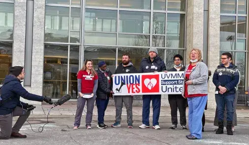 Vermont health professionals standing together