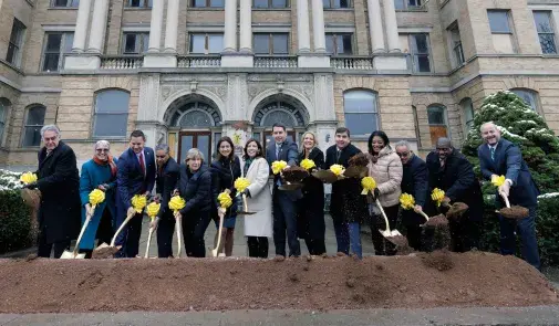 AFT President Randi Weingarten, fifth from left, joins regional officials and Micron executives at the groundbreaking in Syracuse. Photo courtesy of Gov. Hochul's office.