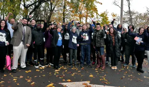 Weingarten, center, with voters in Pittsburgh at an AFT Votes event on Nov. 2, 2022.