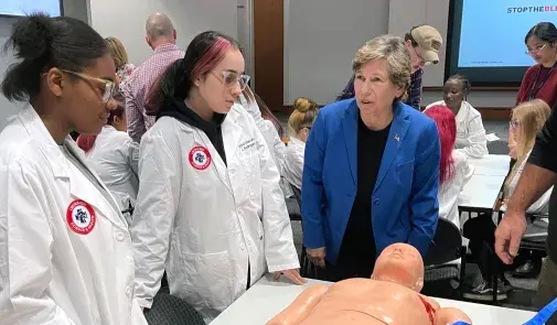 Weingarten, right, with students at Lincoln-West School of Science and Health at MetroHealth hospital in Cleveland on Oct. 24.