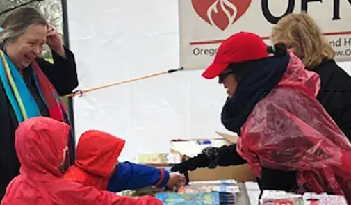 OFNHP members distributing books