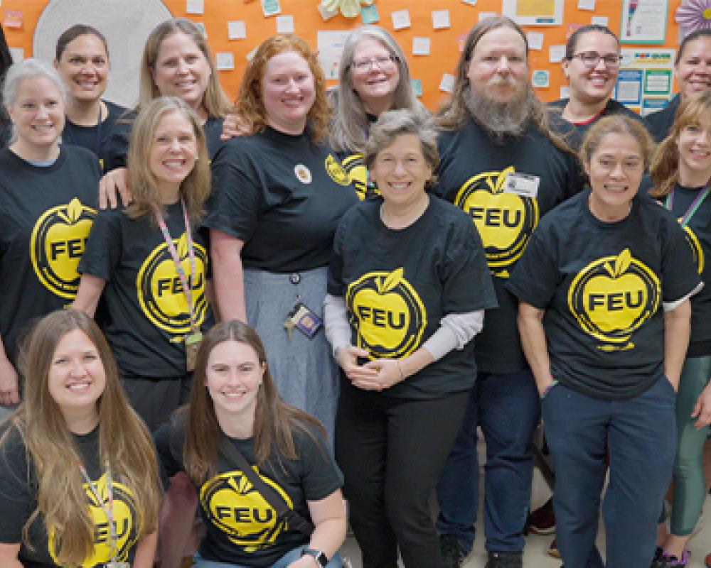 Randi Weingarten poses with teachers and school support professionals in Fairfax County, VA, after the educators voted to join the AFT and NEA as FEU United.