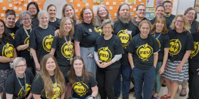 Randi Weingarten poses with teachers and school support professionals in Fairfax County, VA, after the educators voted to join the AFT and NEA as FEU United.