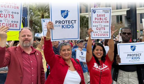 AFT Executive Vice President Evelyn DeJesus with others at a March 4th event to Protect Our Kids